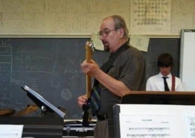 instrumental teacher-mr. wheeler teaching guitar